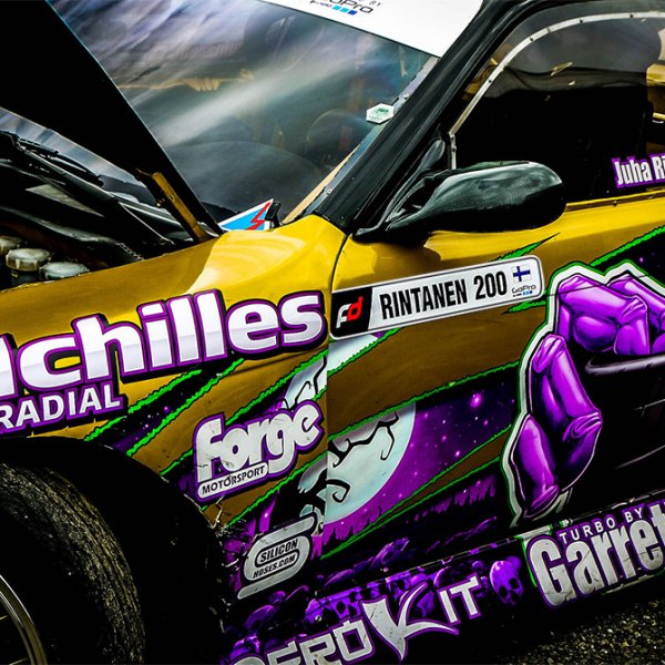 ACHILLES® - Tires on Racing Car