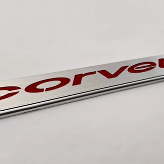 ACC® - GM Licensed Series Brushed License Plate Frame with Garnet Red Solid Corvette Logo
