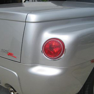 American Car Craft® - Tail Light Bezel Trim with Etched Corvette Emblem