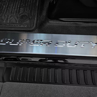 ACC® - Non-Illuminated Brushed Black Front Door Sills with SUPER DUTY Logo