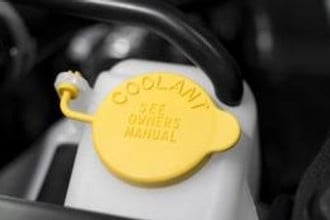 Coolant Leaks: Symptoms, Causes, & Solutions