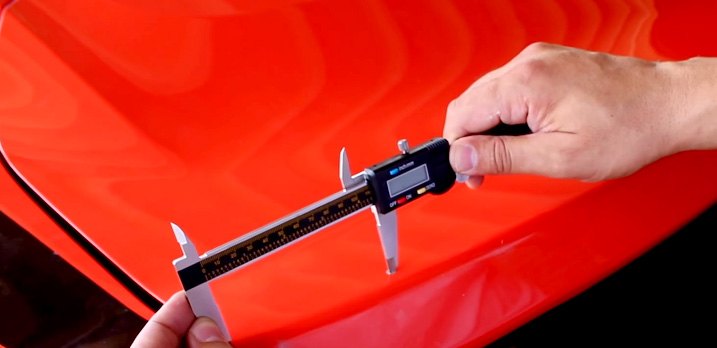 Taping Down Locater Strips Onto Trunk