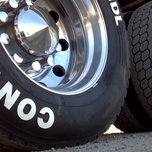 CONTINENTAL® - White Letter Tires on Chrome Rims