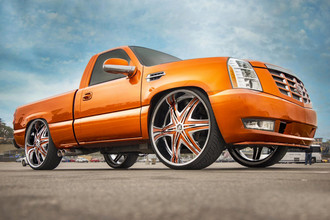 Elite Chrome Orange Inserts on Cadillac Escalade
