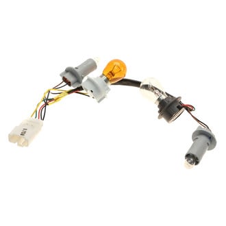 Genuine® - Driver Side Outer Replacement Tail Light Bulb Holder