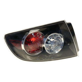 Genuine® - Driver Side Outer Replacement Tail Light