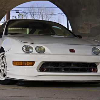 Aftermarket Front Bumper on White Acura Integra - Photo by dan kinzie
