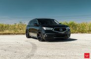 Black on Black Mean Acura MDX Enhanced with Crystal Clear Headlights