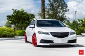 Sleek White Acura TLX on Red Vossen Wheels