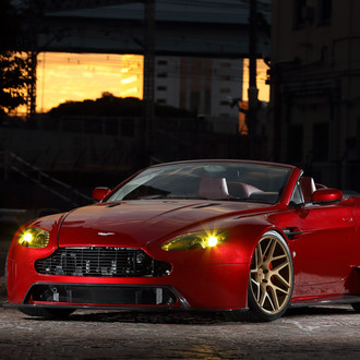 Aston Martin Vantage With Carbon Fiber Lip Spoiler and Bronze Vossen Wheels - Photo by Vossen