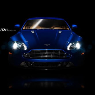 LED Headlights on Custom Blue Aston Martin Vantage - Photo by ADV.1