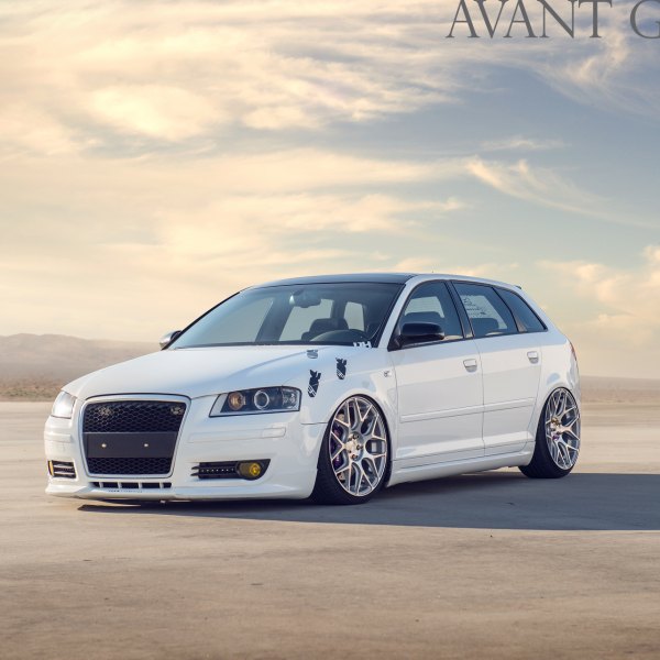 White Lowered Audi A3 with Aftermarket Headlights - Photo by Avant Garde Wheels