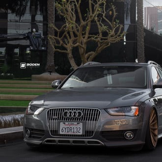 Quintessence of Style: Grey Audi A4 on Bronze Wheels