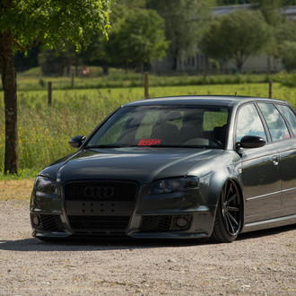Blacked Out Audi A4 with Custom Grille - Photo by Vossen