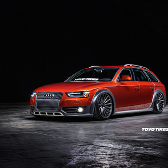 Stanced Orange Audi A4 on Vossen Wheels Wrapped in Toyo Tires