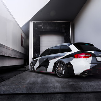 Custom Painted Audi A4 on Pirelli Tires - Photo by Vossen