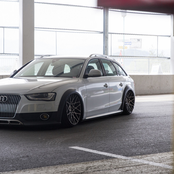 White Audi A4 with Aftermarket Bumper Guard - Photo by Rotiform