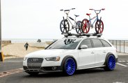 Car Enthusiasts Dream: White Audi A4 Wagon with Bike Rack