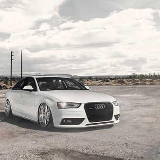 White Audi A4 with Aftermarket Front Bumper - Photo by Avant Garde Wheels