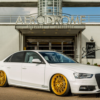 Custom White Audi A4 with Gold Wheels - Photo by Vossen