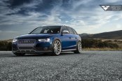 Chrome Billet Grille and Silver Custom Rims Looking Good on Blue Audi A4