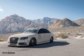 White Debadged Audi A4 Goes Even More Royal with Aftermarket Parts