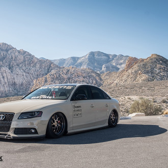 White Debadged Audi A4 Goes Even More Royal with Aftermarket Parts