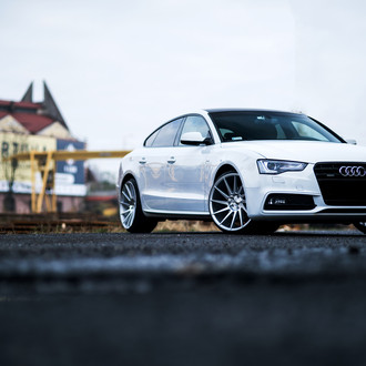 Graceful White Audi A5 with Styling Tweaks