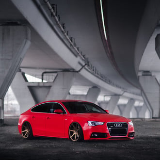 Front Bumper with Fog Lights on Red Audi A5 - Photo by JR Wheels