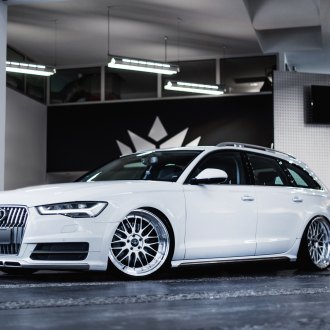 White Audi A6 Outfitted with Custom Roof Rack and Other Add-ons — CARiD ...