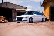 White Audi A6 Outfitted with Custom Roof Rack and Other Add-ons
