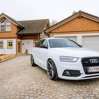 White Audi Q3 with Custom Front Lip - Photo by Vossen