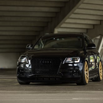 Audi Q5 Looking Menacing Being Blacked Out and Sitting on Bronze Custom Wheels