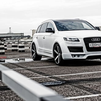Custom Front Bumper Cover with Fog Lights on White Audi Q7 - Photo by Vossen