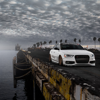 White Customized Audi S4 with Aftermarket Front Lip - Photo by Vossen