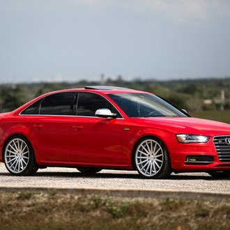 Prominent Red Audi S4 Fitted with Custom Accessories