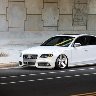 White Lowered Audi S4 with Custom Headlights - Photo by TSW