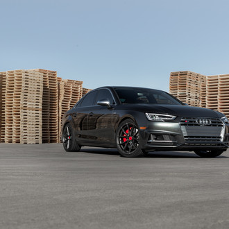 VIP Appearance of Audi S4 Highlighted by Custom Wheels with Contrasting Red Calipers and Center Caps