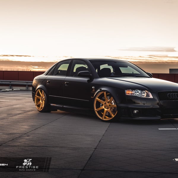 Custom Black Audi RS4 with Aftermarket Headlights - Photo by Vossen