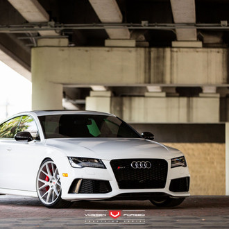 Blacked Out Grille and Chrome Wheels Emphasizing the Looks of White Audi S7
