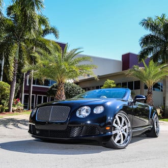 Reworked Face of Black Convertible Bentley Continental with Chrome Mesh Grille