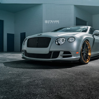 Gray Bentley Continental Rocking a Set of Matte Black Strasse Rims with Contrasting Gold Lip