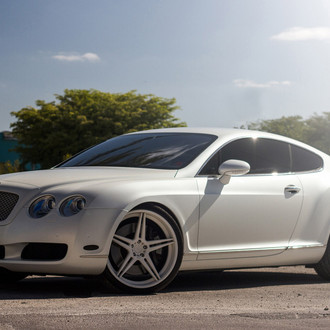 White Bentley Continental with Custom Front Bumper - Photo by ADV.1