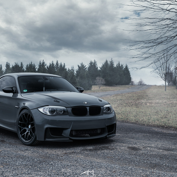 Gray BMW 1-Series with Dark Smoke Headlights - Photo by Arlen Liverman