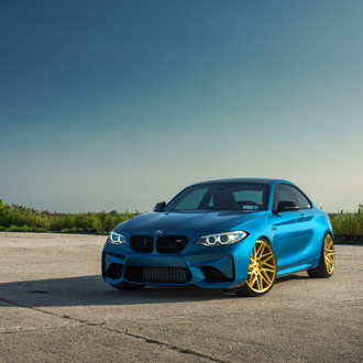 Blue BMW 2-Series with Aftermarket Headlights - Photo by Vossen