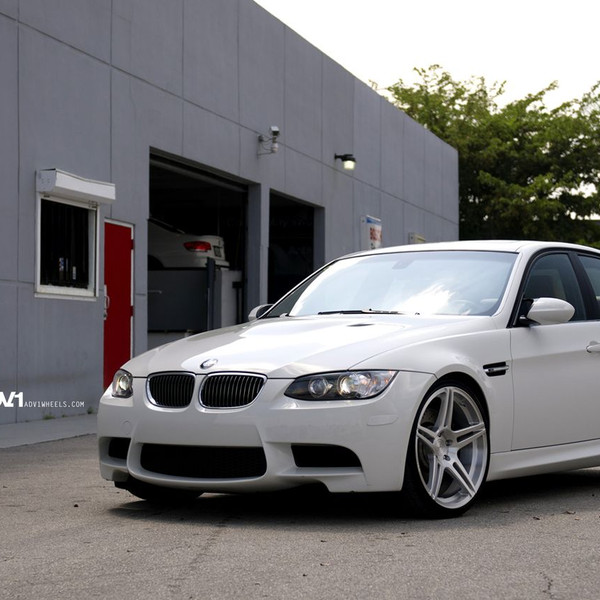 White BMW 3-Series with Aftermarket Halo Headlights - Photo by ADV.1