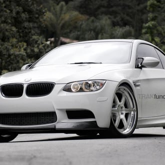 White BMW 3-Series with Aftermarket Front Lip - Photo by ADV.1