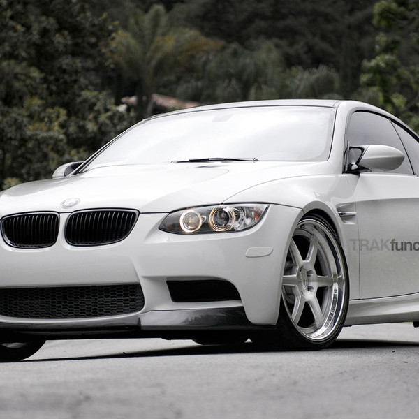 White BMW 3-Series with Aftermarket Front Lip - Photo by ADV.1
