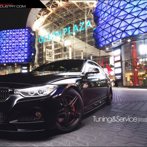Gloss Black BMW 3-Series with DRL Headlights - Photo by ADV.1