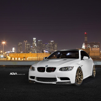 Fascinating White BMW M3 on a Night City Scenery